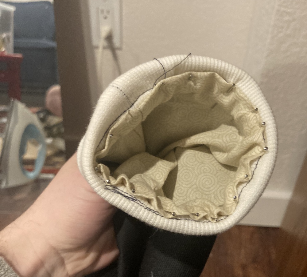 Sleeve ends pinned in place from inside